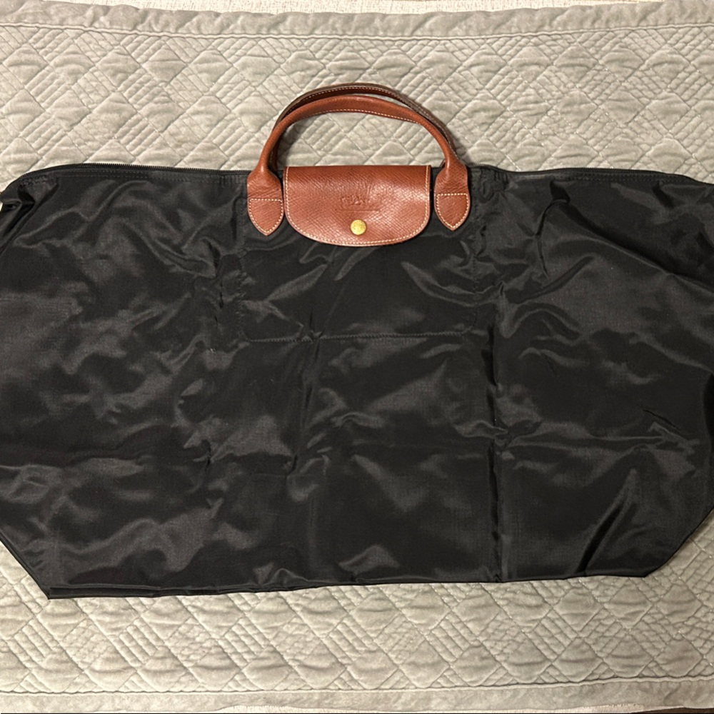 Dooney & Bourke Black Duffel Bag with Brown Handles